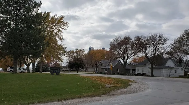 Welcome sign in Knierim, Iowa. Looking southwest from intersection of 230th St. and 1st Ave.