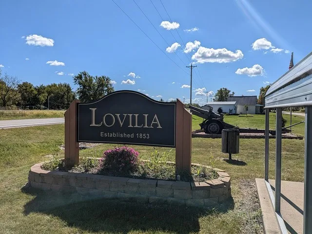Lovilia, Iowa, welcome sign and cannon