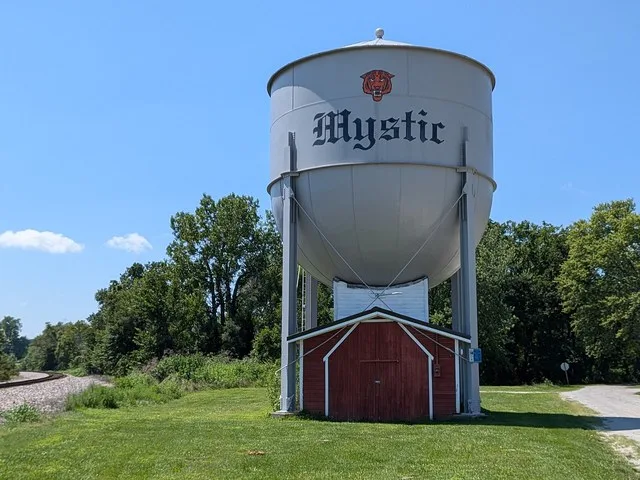 A railroad water tank near the south end of Mystic, Iowa