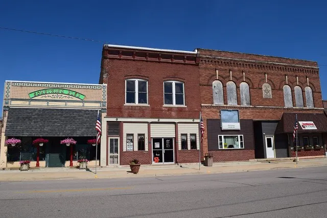 Buildings along Iowa Highway 38 in downtown Olin, Iowa . The buildings are part of the Business Part of Olin Historic District .