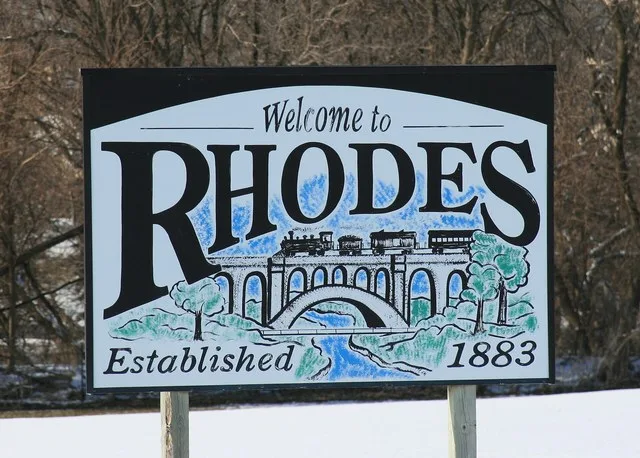 Welcome sign outside Rhodes, Iowa