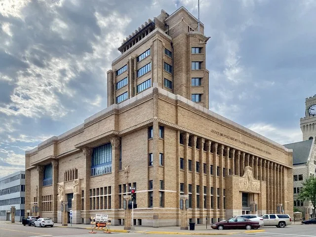 Built in 1916-1918, this Prairie-style building was designed by George Grant Elmslie and William Gray Purcell of Purcell and Elmslie, with local architect William L. Steele overse...