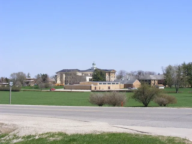 View of the Iowa Braille & Sight Saving School campus in Vinton, Iowa , looking northeast towards the school from the corner of K Avenue (US Highway 218) and 13th Street.