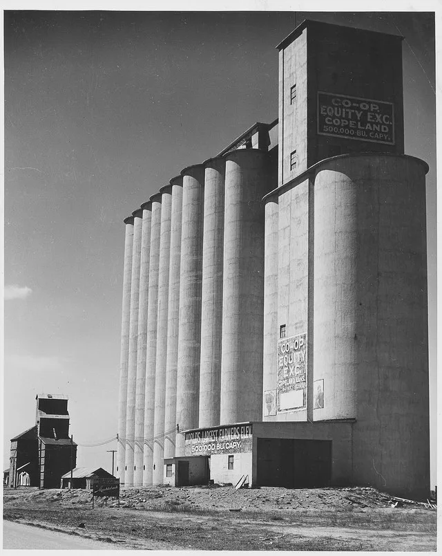 Scope and content: Full caption reads as follows: Haskell County, Kansas (Copeland). The "world's largest farmers' elevator" at Copeland, a few miles from Sublette. General notes...