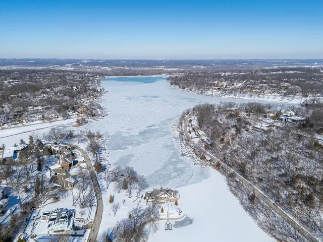 Snow covered Lake Quivira in the wintertime. Taken via drone from the South end of the lake looking North.