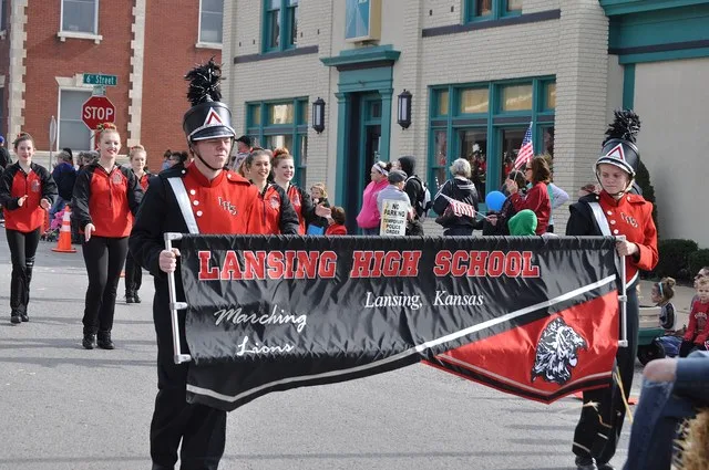The Lansing High School band marches in the 2015 Leavenworth County Veterans Day Parade.
