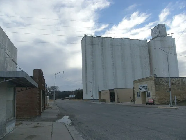 Facing southwest, as the tracks and the streets were perpendicular to the tracks.
