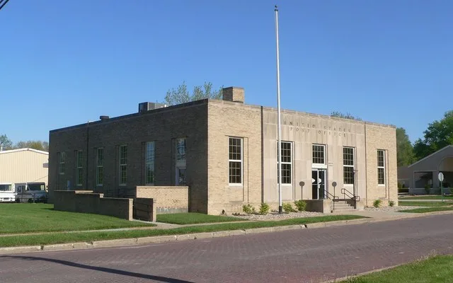 Post office at northeast corner of 9th and Virginia Streets in Sabetha, Kansas; seen from the northwest, looking obliquely across 9th.