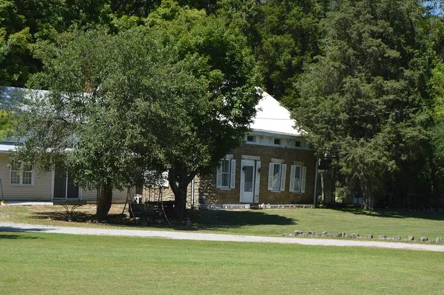 Front of the Pleasant Run Stone House I , located along Bromley-Crescent Springs Road south of Bromley in unincorporated Kenton County , Kentucky , United States . Built in 1840...
