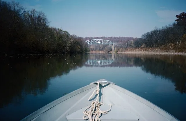 Looking N (downstream) toward Kentucky State Route 22 Bridge . bow of Sears Gamefisher dinghy in foreground. Kentucky River mile 29. near Gratz , Kentucky. Nov. 1987. File # 87k09...
