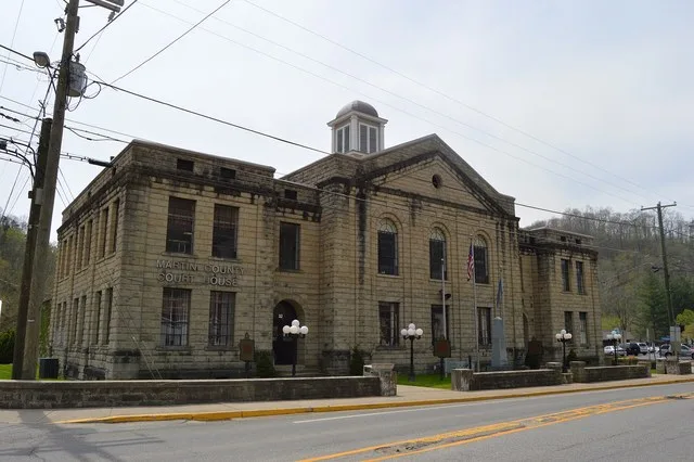 Front and eastern side of the Martin County Courthouse , located along Kentucky Routes 3 / 40 on Courthouse Square in Inez , Kentucky , United States . Built in 1938, it is listed...