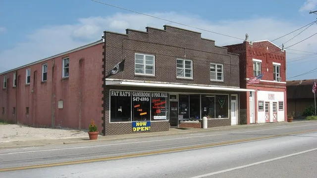 Buildings on the eastern side of the 200 block of S. First Avenue ( Kentucky Route 79 ) in downtown Irvington , Kentucky , United States . This block is a part of the Irvington Hi...