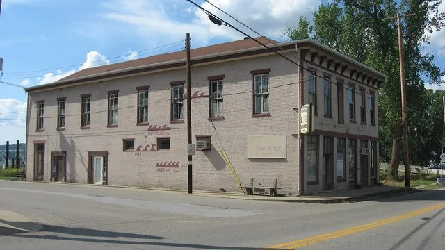 Front and southern side of Ginn's Furniture Store , located on Main Street ( U.S. Route 421 ) in the old section of Milton , Kentucky , United States . It is listed on the Nationa...