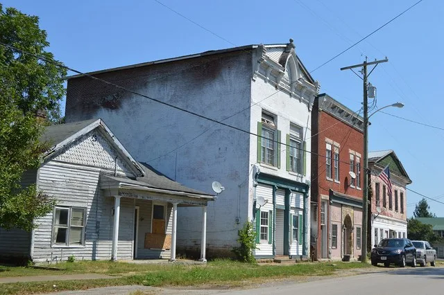 Buildings on the northern side of Main Street ( U.S. Route 460 ) near the Cook Street intersection in North Middletown , Kentucky , United States .
