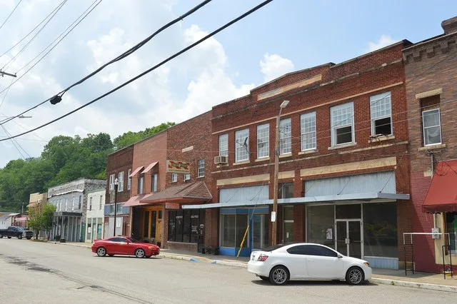 Northern side of Railroad Street, looking west from the Cross Street intersection, in Olive Hill , Kentucky , United States .