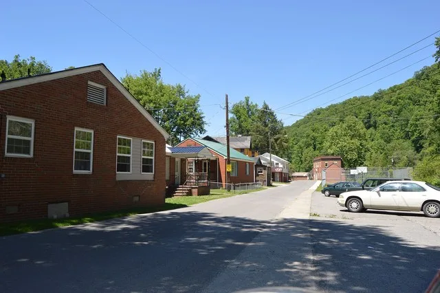 Looking north on Main Street ( Kentucky Route 306 ) from a residential district toward downtown in Wheelwright , Kentucky , United States .