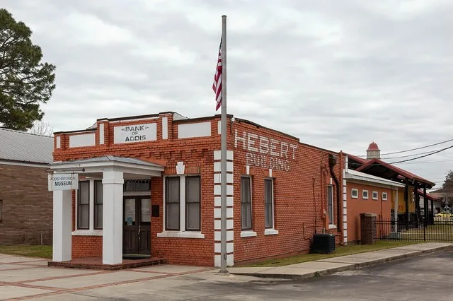 In Addis, Louisiana. You can just barely see a Union Pacific caboose in the park behind the building.