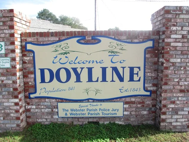 Revised, Doyline, LA welcome sign