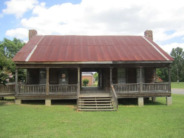 I took photo of dogtrot house in downtown Dubach off U.S. Hwy. 167, with Canon camera.