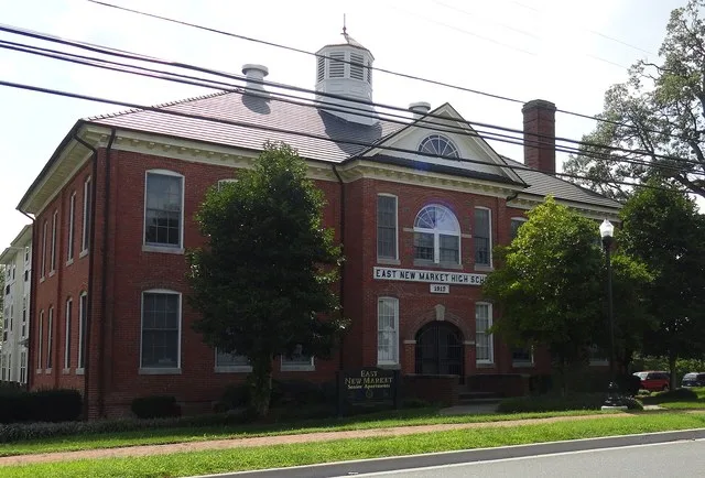 East New Market Historic District Located on Route 14, the original school was called East New Market Academy and began operating in 1818. In 1912 a larger brick school was built...