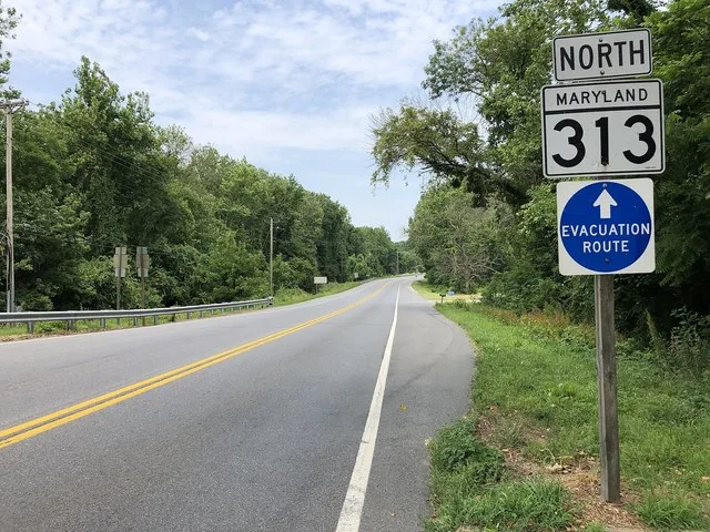 View north along Maryland State Route 313 (Greensboro Road) at Maryland State Route 314 (Whiteleysburg Road) in Greensboro, Caroline County, Maryland