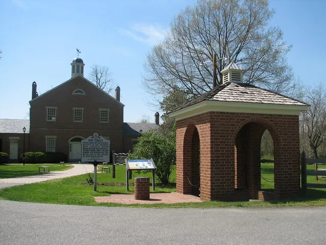 Scope and content: The original finding aid described this photograph as: Original Caption: The Port Tobacco Courthouse, the imposing brick structure in the background, dates back...