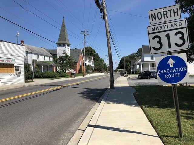 View north along Maryland State Route 313 (Church Street) at Maryland State Route 300 (Main Street) in Sudlersville, Queen Anne's County, Maryland
