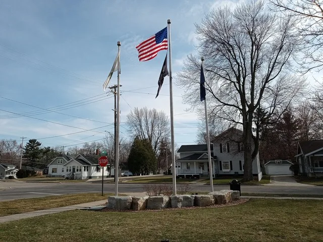 flagpoles outside4 of coopersville michingan's city hall
