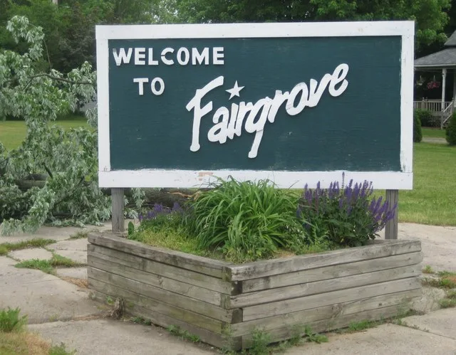 Fairgrove, Michigan, village sign at intersection of Main Street and Fairgrove Road (M-138), facing southeast
