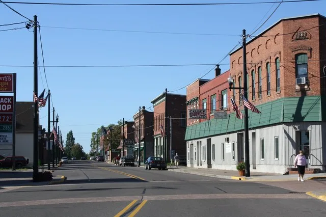 Looking south in downtown w:Lake Linden, Michigan on w:M-26 (Michigan highway) , listed on the National Register of Historic Places as the w:Lake Linden Historic District . This f...