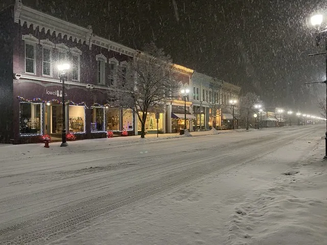Downtown Lowell, looking east on Main Street, on a snowy night in early 2021.