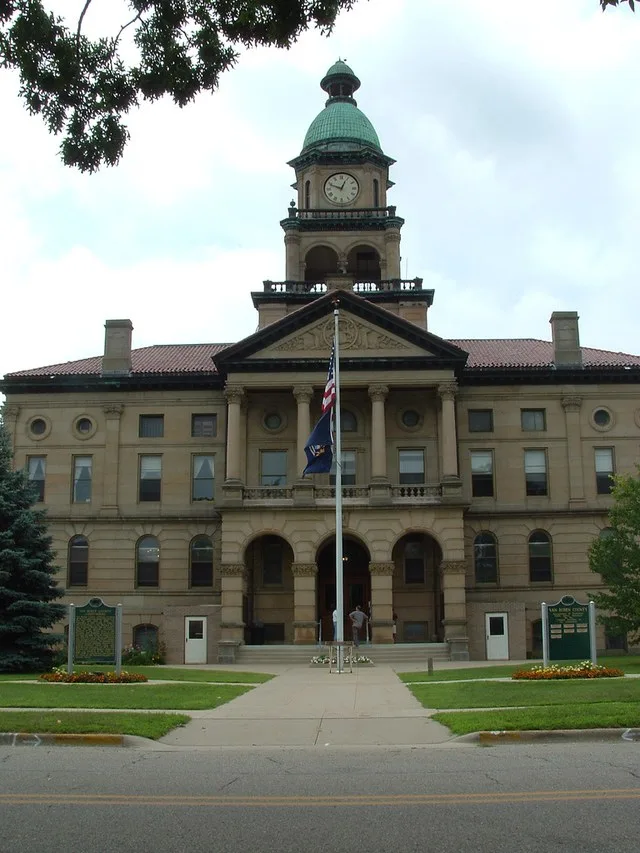 The Van Buren County Courthouse located in Paw Paw, Michigan . Neoclassical style architecture — on the National Register of Historic Places .