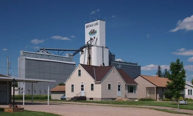 Residences and grain elevator looking northeast from W. Borden Ave, Buffalo Lake, Minnesota, USA.