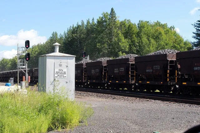 Ore cars carrying iron ore through Iron Junction, Minnesota