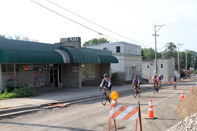 Cyclists going down Lake Independence Regional Trail/Hwy 19 (Under construction) Loretto, Minnesota
