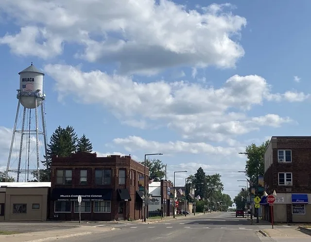 Businesses at1st Street W. and Central Avenue with watertower Milaca, Minnesota