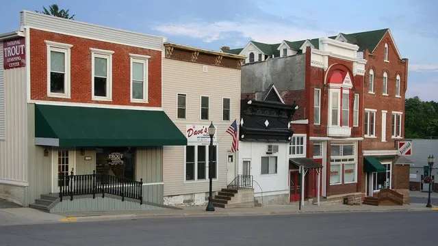 The National Trout Learning Center (left) and a block of commercial buildings seen from the east side of the Fillmore County Courthouse in Preston, Minnesota