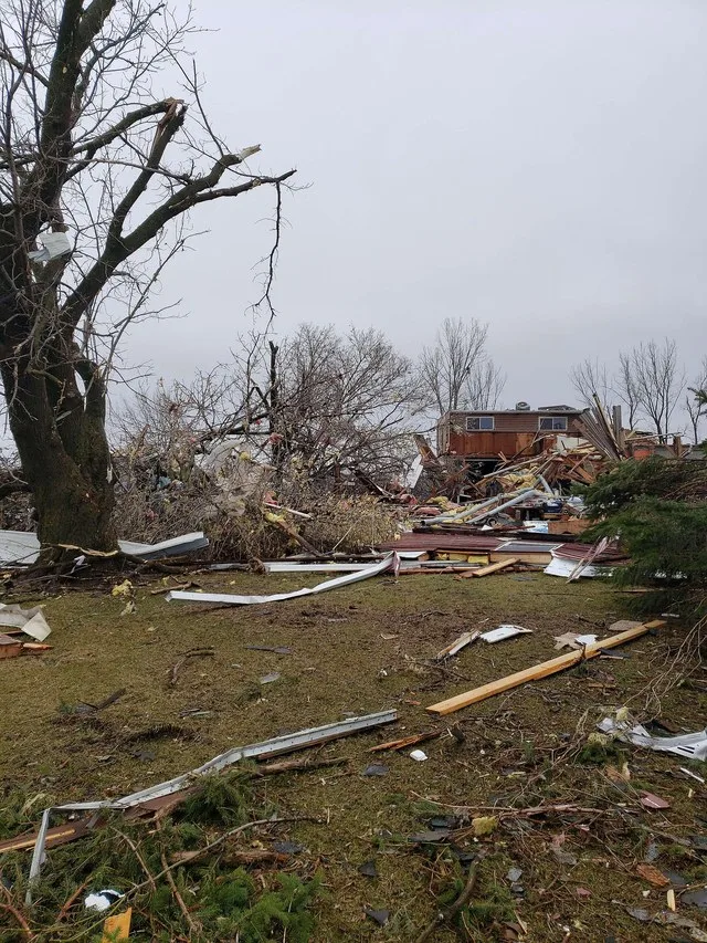 Heavy EF2 damage to a home and trees on the west side of Taopi, Minnesota.