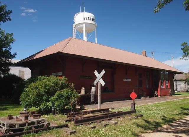 Chicago, St. Paul, Minneapolis, & Omaha Depot (now the Westbrook Heritage House Museum) and the Westbrook water tower, Westbrook, Minnesota, USA. Viewed from the southwest.