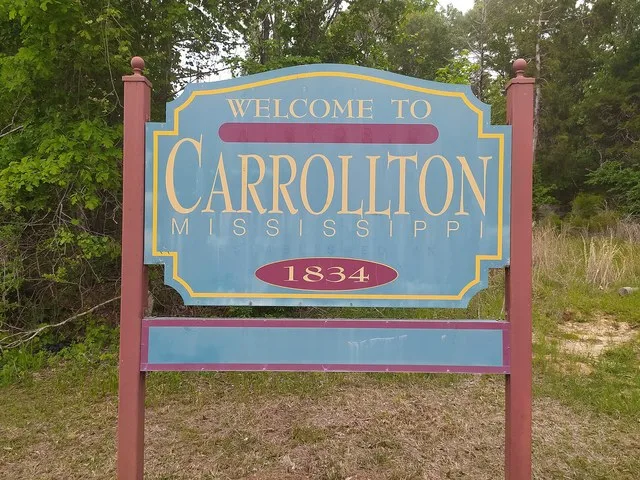 Welcome To Carrollton sign located on US Highway 82 West