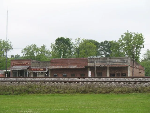 Across the tracks from downtown Duck Hill.