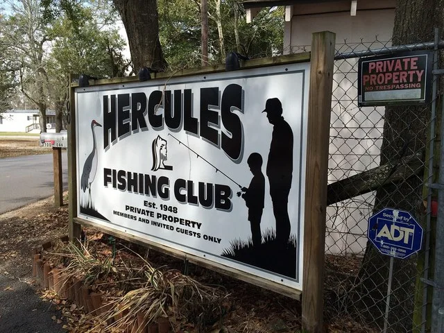 The club is near US Highway 90 and the Singing River.