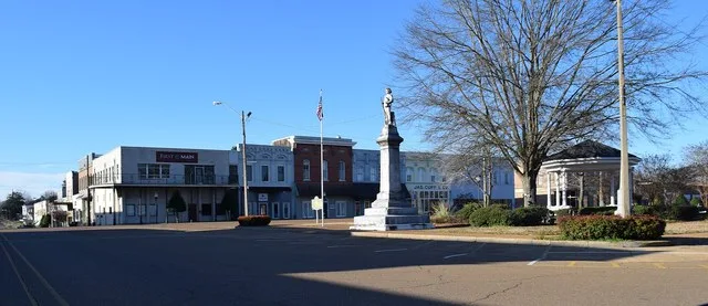 The south side of the square in downtown Grenada, Mississippi with the Confederate monument