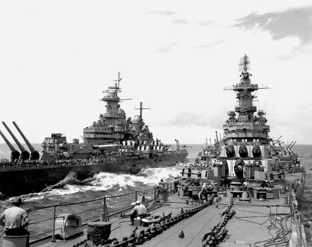 USS Missouri (BB-63) (at left) transferring personnel to USS Iowa (BB-61), in advance of the surrender ceremony planned for 2 September, while operating off Japan on 20 August 194...