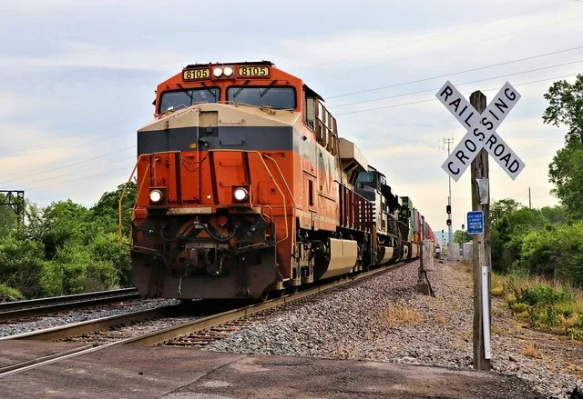 Norfolk Southern 8105 Interstate Heritage Unit, 1112 and 8051 Leading a Westbound 21T Intermodal on the NS Kansas City District seen here along NE Birmingham Road East of Front St...