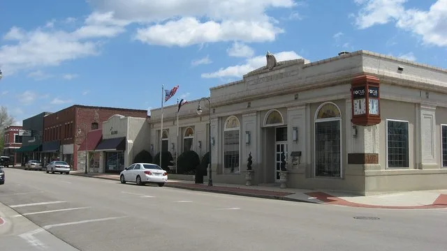 Buildings on the eastern side of Ward Avenue north of the Fourth Street intersection in downtown Caruthersville , Missouri , United States .