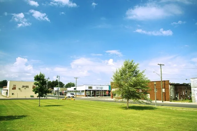 Buildings at the corner of Laclede and Madison viewed from across Cotton Belt Park in Malden, Missouri, United States.