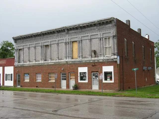 An iron-front store building in New Florence, Missouri. The facade was manufactured in St. Louis by Mesker Brothers.