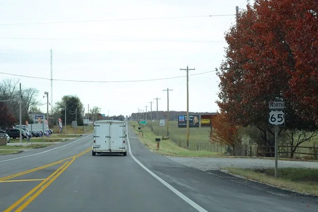 US65 North Sign at US54 in Preston