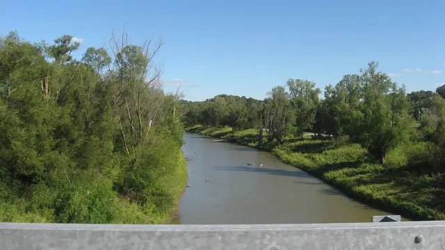 Looking eastward (downstream) along the old riverbed at the southern end of the causeway between Kaskaskia , Illinois and St. Mary , Missouri in the United States . Until a catast...